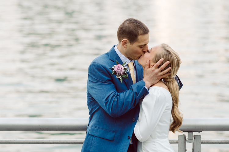 Colleen and Patrick had an intimate wedding ceremony at their church in Queens, NY then we went over to Gantry Plaza State Park LIC for their wedding photos. Colleen and Patrick's NYC elopement was nothing but fabulous and spectacle. When I saw all the food trucks lined up along Gantry Plaza State Park I knew I wanted to use it as our backdrop for Colleen and Patrick. Of course we chose "Mr Softee's Ice Truck" and as we were taking the photo one of Colleen and Patrick's cousin walked by doing the most epic photobomb ever! Colleen and Patrick's NYC elopement Gantry Plaza State Park LIC captured by NY NJ Weddings, Elopements and Family Photographer Karis by Hey Karis.